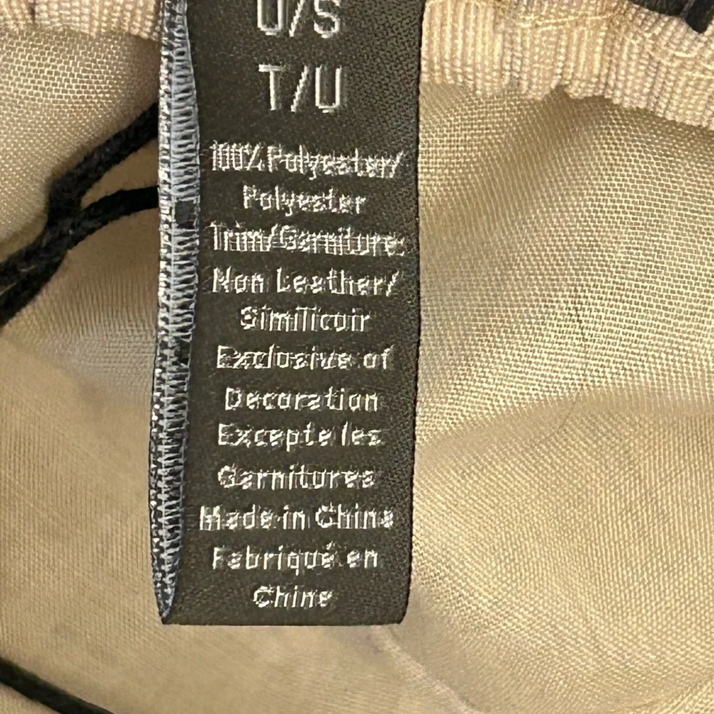Vince Camuto Quilted Cream Bucket Hat with Tan Trim and Gold Emblem